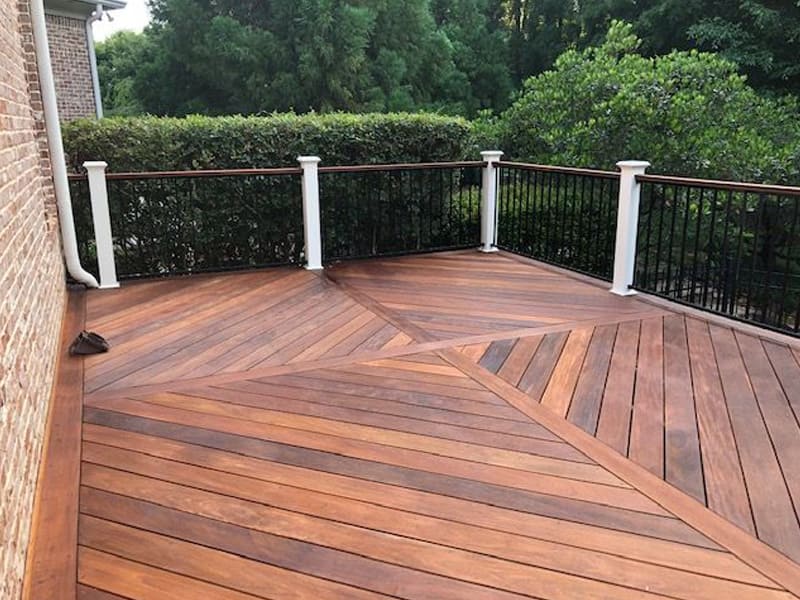 A Beautiful exterior of a wooden deck installed by Exterior Design + Decks in Woodstock, GA.